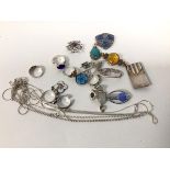 A collection of mostly silver jewellery including rings, brooches, chains, some set turquoise,