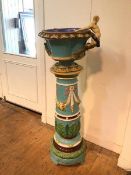 A Victorian Minton style turquoise glaze, majolica urn on stand, the urn of quatrefoil form with