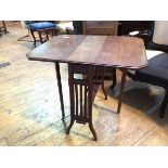 An Edwardian mahogany Sutherland table, the rectangular top with canted corners and moulded edge