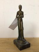 A 1920s/30s novelty lighter, in the form of a spelter female figure with a light striker to side, on