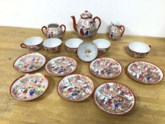 An early 20thc Chinese tea service, including teapot (14cm), six teacups, one with figure of a woman