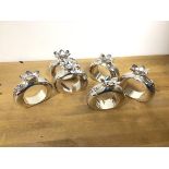 A set of six Silea napkin rings in the form of pomegranates (6cm x 6.5cm x 2.5cm)