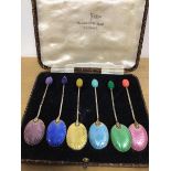 A set of six Birmingham silver Walker & Hall coffee bean spoons with enamelled bases to bowls, in