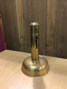 A brass sprung candlestick (20cm)
