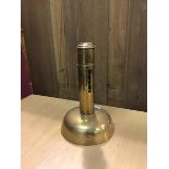 A brass sprung candlestick (20cm)