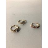 A group of three gem set 9ct gold rings (J/K) (combined: 5.89g)