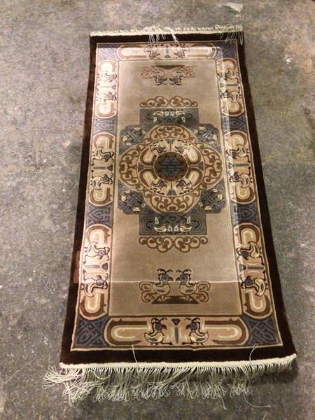 A small Chinese runner with central medallion and multiple birds (125cm x 62cm)