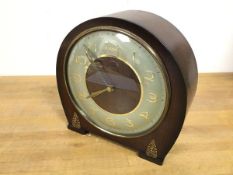 A 1930s/40s mantel clock, with mahogany case, stamped Smiths (20cm)