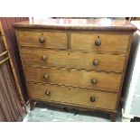 A Victorian mahogany chest of drawers fitted two short drawers above three long graduated drawers,