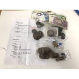 A collection of coins and banknotes including Victorian British crowns, a Rathven Parish Church