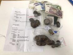 A collection of coins and banknotes including Victorian British crowns, a Rathven Parish Church