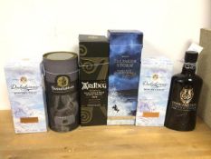 A collection of whisky including Bunnahabhain, a Highland Park, Viking Tribe, two Dalwhinnie,