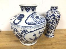An early 20thc Chinese blue and white vase, with birds, butterflies and flowers, four character