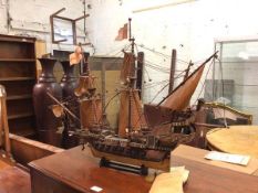 A model of the Golden Hind, on stand some losses (60cm x 80cm x 31cm)