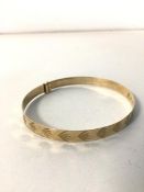 A 9ct gold child's bracelet (5.5cm fully open) (3.22g)