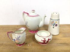 A 1930s Royal Doulton child's teaset including teapot (13cm), milk jug and sugar bowl together