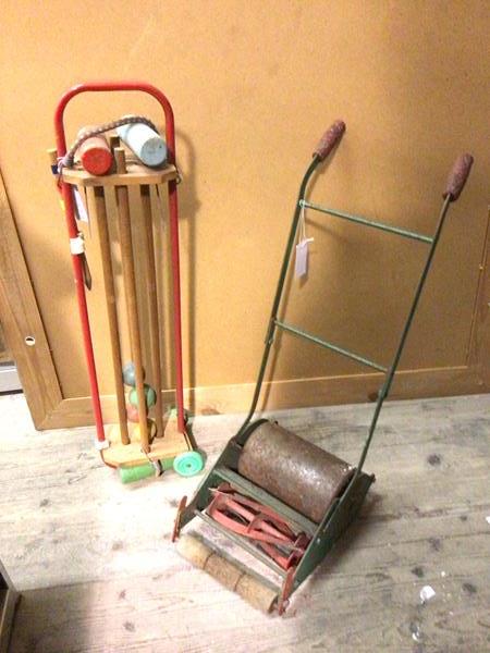 A child's croquet set (87cm) and a toy lawnmower (2)