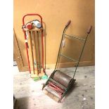 A child's croquet set (87cm) and a toy lawnmower (2)