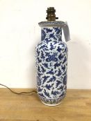 A Chinese baluster shaped vase, converted to table lamp, with blue and white leaf and flower