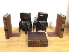 Two pairs of novelty bookends, including one pair with carved elephants (16cm) and two with