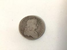 A Charles II 1676 crown in VG to fair condition
