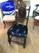 A Victorian ebonised and gilt decorated side chair, the splat with painted panel depicting a