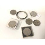 An Edwardian Birmingham silver bangle (7cm), seven commemorative coins (a lot)