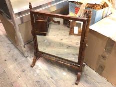 A Victorian hinged dressing table mirror, the rectangular glass on turned supports, on trestle