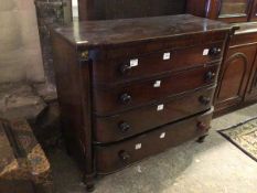 A Victorian mahogany chest of drawers, the shaped rectangular top above four graduated drawers
