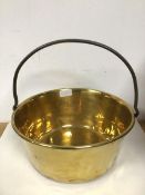 A brass preserve pan with fixed iron handle (36cm x 40cm)