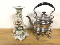 A mixed lot including a German candlestick with cherubs and scrolling vine (27cm), a Mappin & Webb