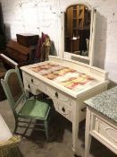 An Georgian style dressing table, the hinged mirror above a concave ledgeback, with moulded top