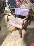 A 1930s/40s beech swivel chair with upholstered back and seat, the body marked Hillcrest, Chair