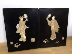 A pair of Japanese lacquer panels, c.1900, each with ivory figures holding fans, seal marks (each: