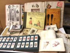 A mixed lot including late Victorian/Edwardian scrap books, The Child's Picture Grammar, Rag Tag and