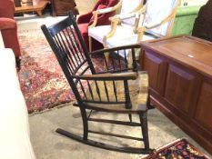 A late 19thc/early 20thc Sussex style rocking chair with turned banister back with matching banister