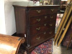 A late George III mahogany chest of drawers, the rectangular top with moulded edge above two short