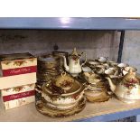 A large set of Royal Albert Country Rose china including teapot (20cm), coffee pot, cups, saucers,