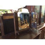 A 1930s/40s triptych dressing table mirror, with shaped frame and glass, on trestle support (open: