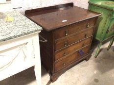 A late 19thc chest of drawers, the rectangular top with ledge back and overhang to either side,