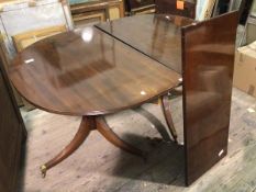 A reproduction mahogany Georgian style double pedestal dining table, with reeded edge, single