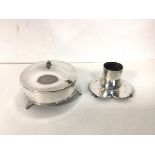 An unusual Edwardian London silver candlestick on bun feet (5cm) and a lidded footed butter dish