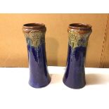 A pair of Royal Doulton vases, with glazed exterior and top interior edge, with a bulging edge and