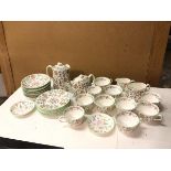 A Minton Haddenhall teaset, including a set of eight teacups, eight saucers and side plates,