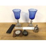 A mixed lot including two wine glasses with blue and clear glass (each: 21cm), a metal bell of a