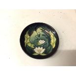 A Moorcroft trinket dish, with waterlilies, stamped Moorcroft '95 (d.12cm)