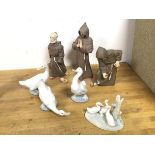 A group of four Nao figures, Ducks (tallest: 15cm) and three Algora figures of Monks (two a/f) (a