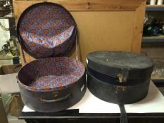 Two vintage hat boxes, one with floral interior (21cm x 45cm)