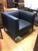 A Walter Knoll tub armchair in black leather on straight tapering supports (69cm x 78cm x 76cm)