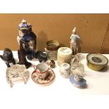 A mixed lot including carved wooden animal figures, Chinese teacup and saucer, a Continental